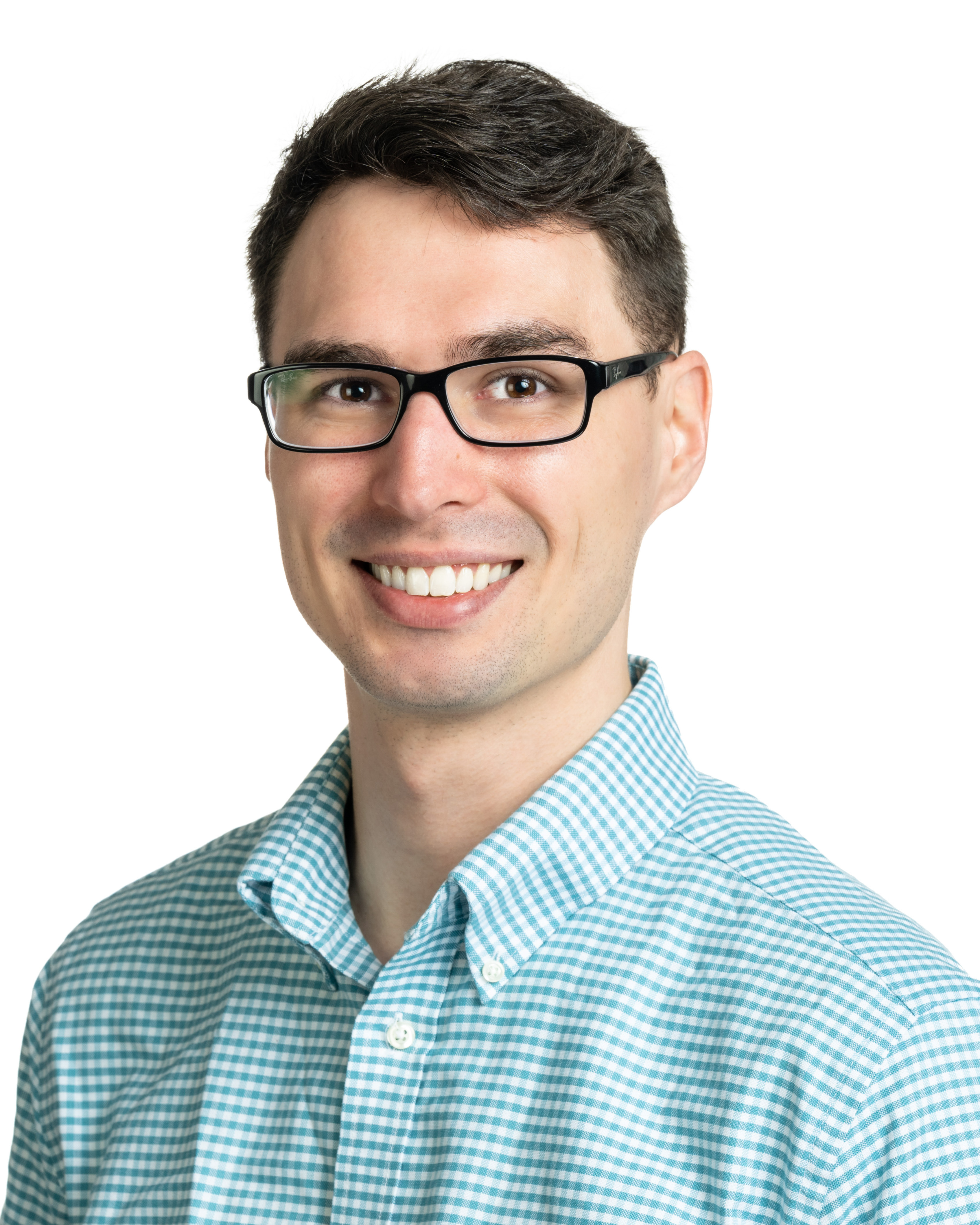 Headshot of Jamison Watson, a man with dark hair wearing glasses and a blue collared shirt