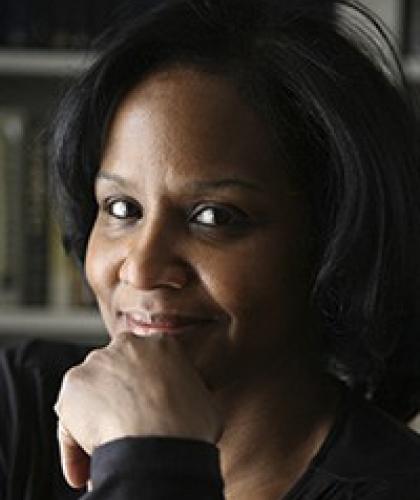 Headshot of Carol Espy-Wilson, a woman with short dark hair wearing a black shirt