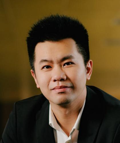 Headshot of Po-Yen Chen wearing a white button down shirt and black jacket